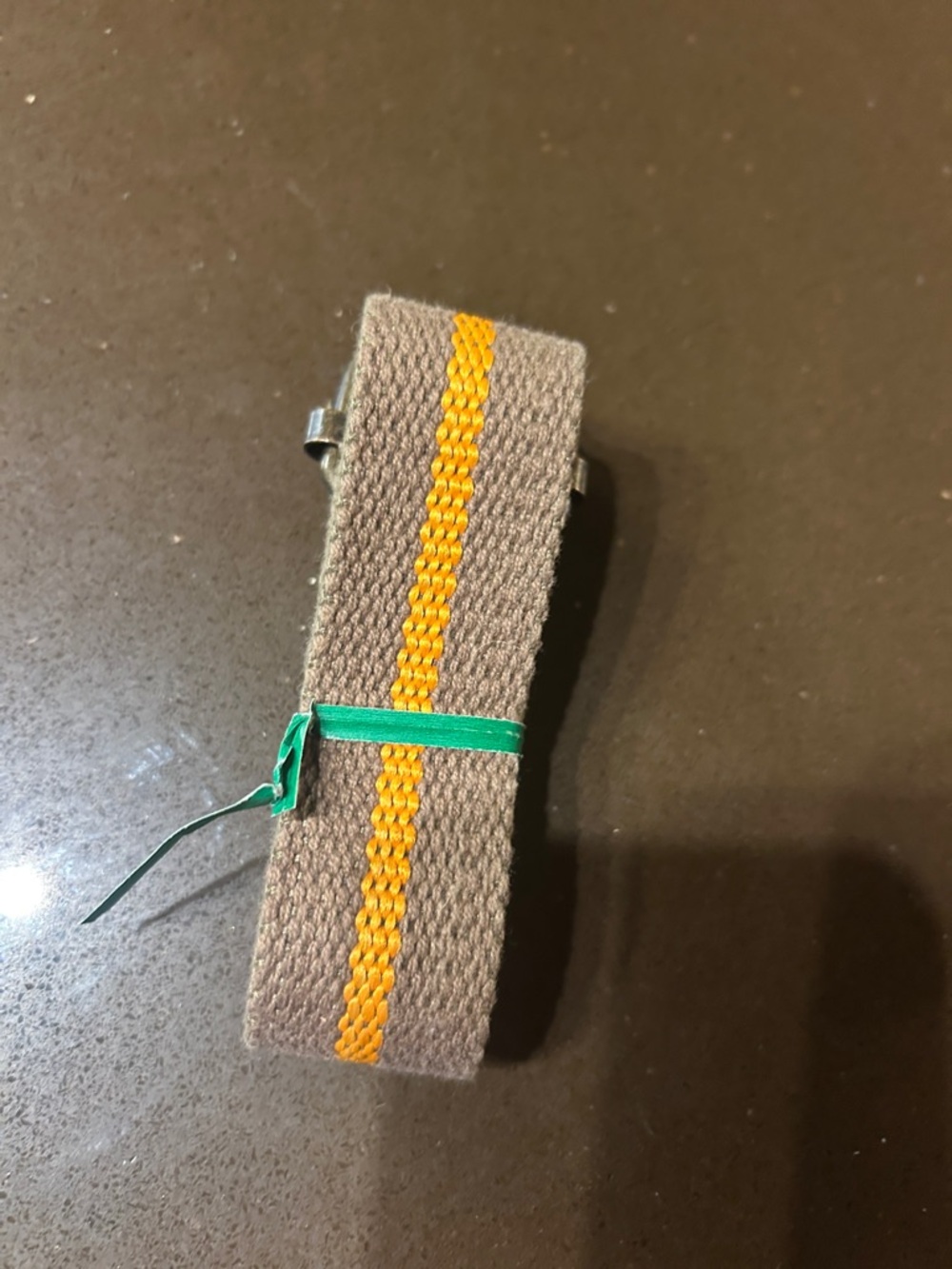 Brown belt with Yellow Center Stripe